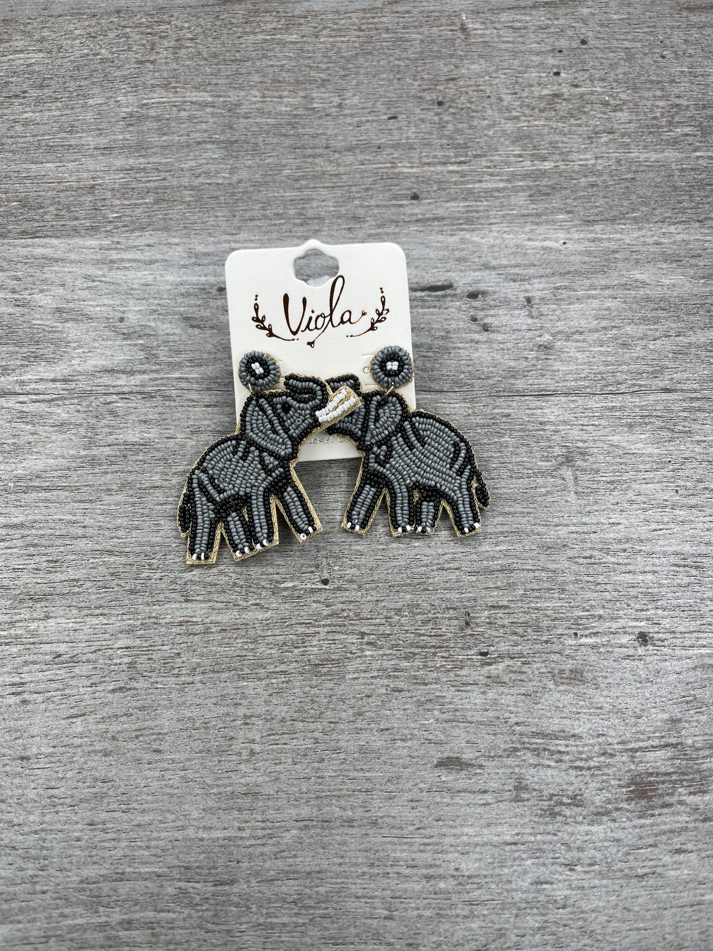 R-O-L-L T-I-D-E Earrings