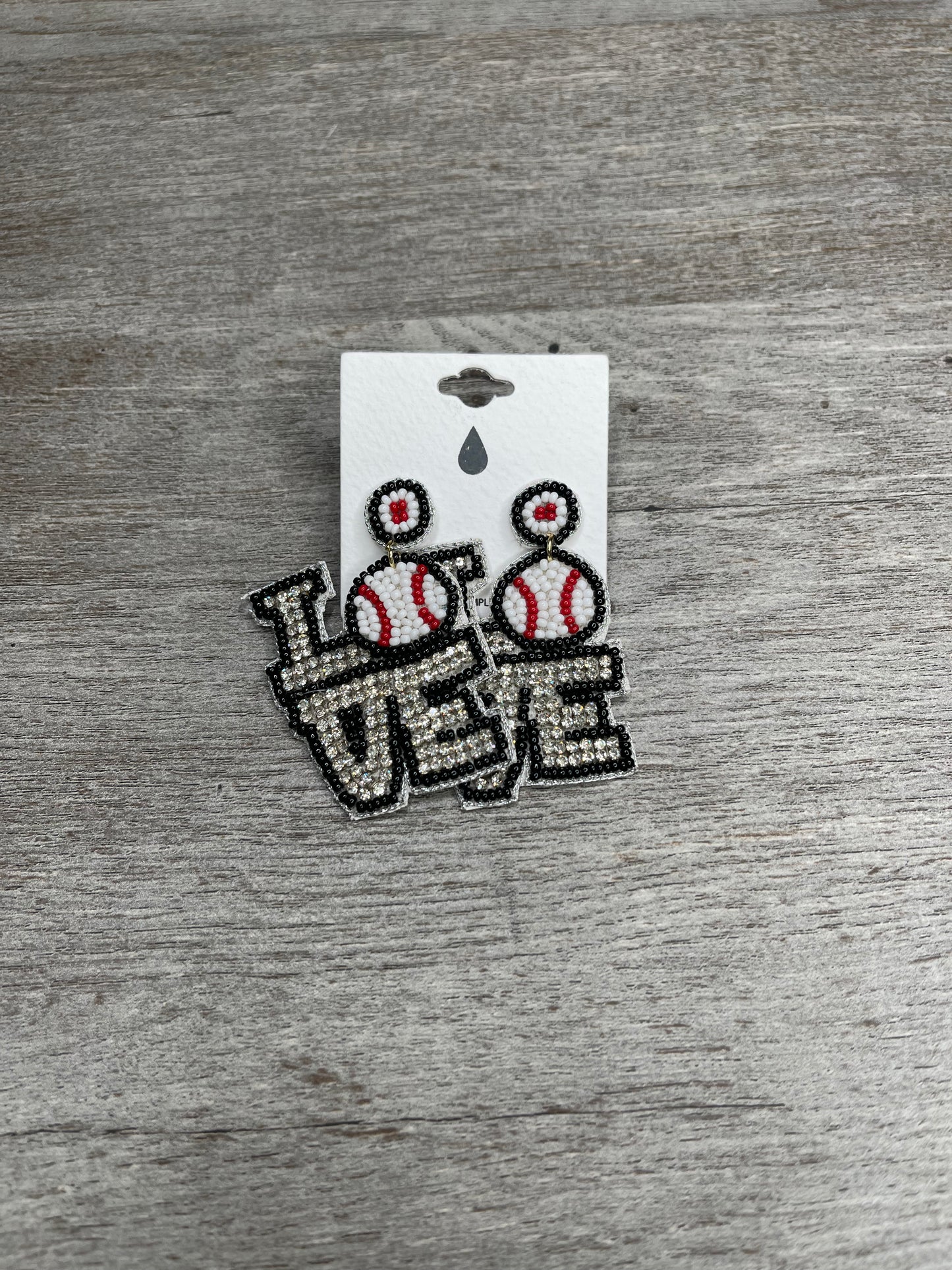 It's Hard To Beat A Person Who Never Gives Up Earrings